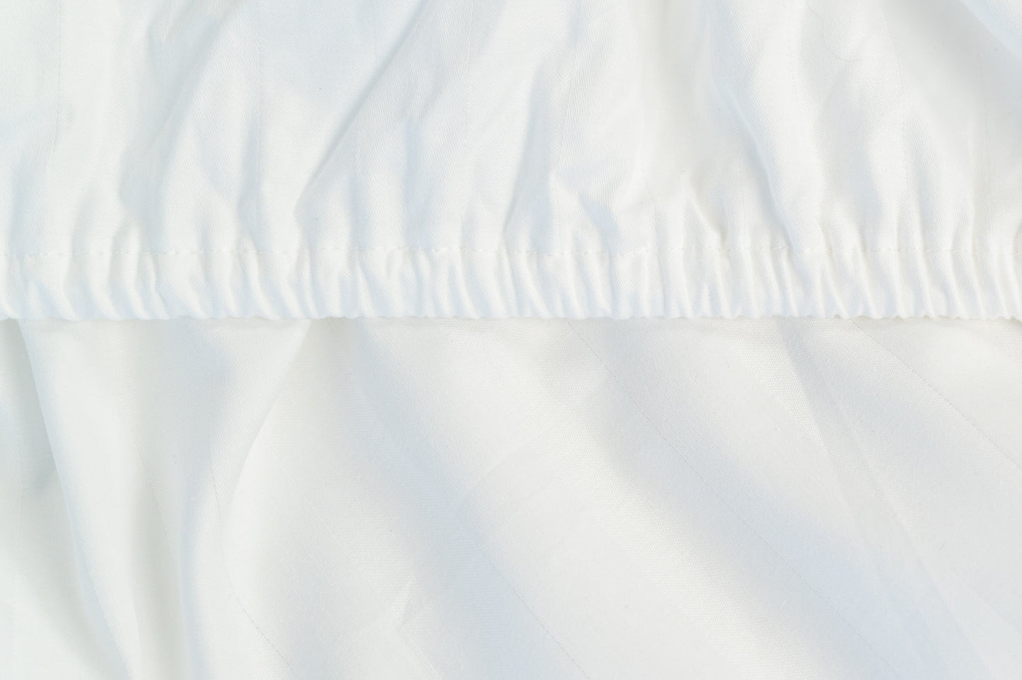 ARTELI premium cotton bedding in minimalist bedroom - cloud-soft white sheets
