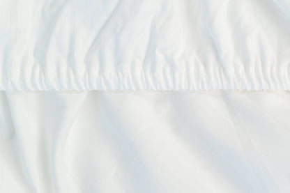 ARTELI premium cotton bedding in minimalist bedroom - cloud-soft white sheets
